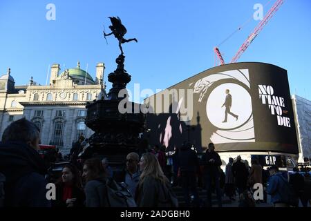 The trailer for the latest Bond film 'No Time to Die' is aired for the first time on the large screen in London's Piccadilly Circus. Stock Photo