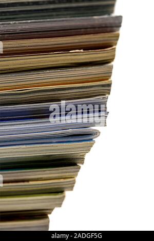 stacked magazines one in in the opposite direction Stock Photo