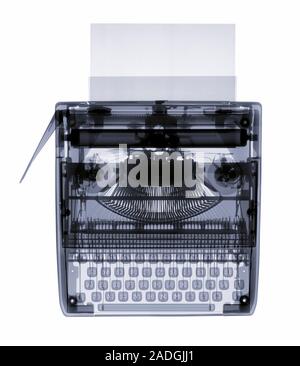 Typewriter X-ray. This is a manual typewriter that uses metal rods (typebars, centre, black lines) at the end of which are raised characters. When a k Stock Photo