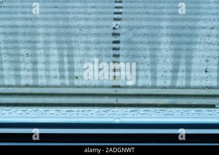 Condensation on large panes of double glazed windows. Stock Photo