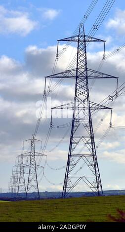 Electricity pylon pictured against the sky Stock Photo - Alamy