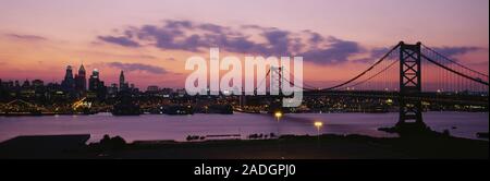 Bridge across a river, Ben Franklin Bridge, Philadelphia, Pennsylvania, USA Stock Photo