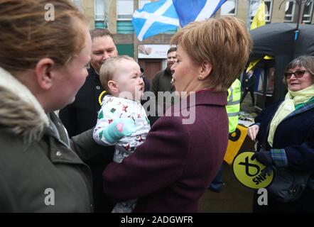 SNP leader Nicola Sturgeon holds a baby in Dalkeith, while on the General Election campaign trail in Scotland. PA Photo. Picture date: Wednesday December 4, 2019. See PA story POLITICS Election . Photo credit should read: Andrew Milligan/PA Wire Stock Photo