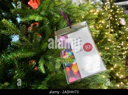 Christmas tree in department store. UK Stock Photo