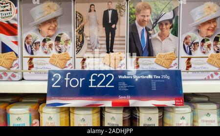 Royal family souvenir Walkers shortbread biscuit tins in airport duty free shop. UK Stock Photo