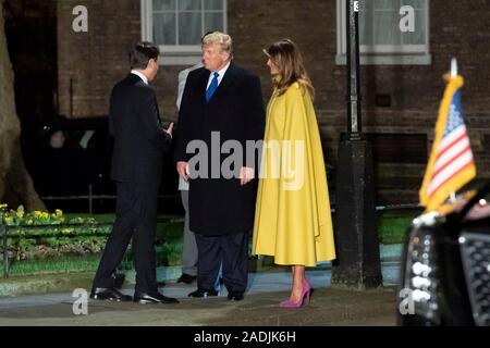 London, United Kingdom. 03 December, 2019. U.S. President Donald Trump, center, and First Lady Melania Trump chat with Italian Prime Minister Giuseppe Conte as they arrive at No.10 Downing Street, prior to a reception in honor of the 70th anniversary of the NATO alliance  December 3, 2019 in London, United Kingdom.   Credit: Andrea Hanks/Planetpix/Alamy Live News Stock Photo