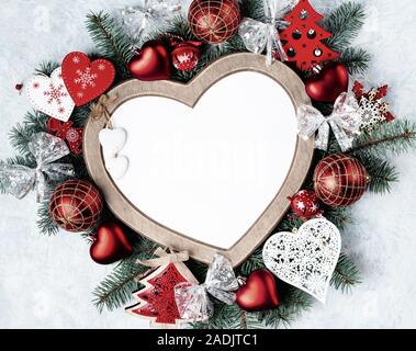 Christmas card, heart-shaped frame, with Christmas decorations