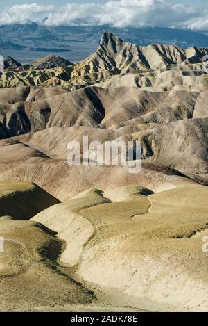 The sun rises over Zabriskie Point in Death Valley National Park, California, USA Stock Photo