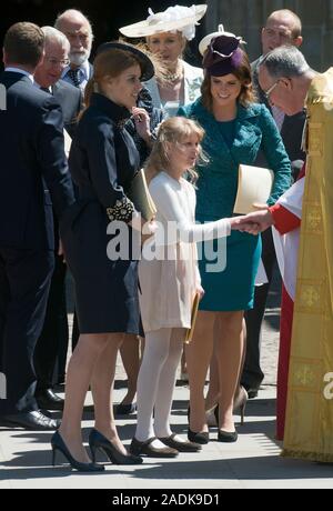 Princess Eugenie and Beatrice with Lady Louise Windsor join  The Queen  at Westminster Abbey for a ceremony to mark the 60th anniversary of her coronation in 1953. Accompanied by the Duke of Edinburgh, Prince Charles and the Duchess of Cornwall, the Duke and Duchess of Cambridge, and other members of the Royal Family June 2013. Stock Photo