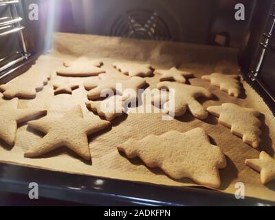 Close up of childs hands making christmas ginger cookies Stock Photo