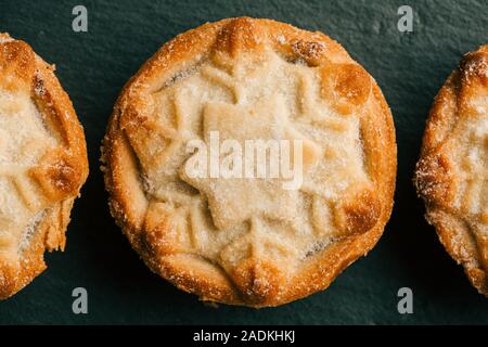 Horizontal photo of the row of mince pies Stock Photo