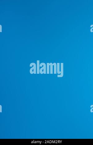 Light blue paper background with copy space for text. Rough paper texture. Colourful decoration for design. Stock Photo