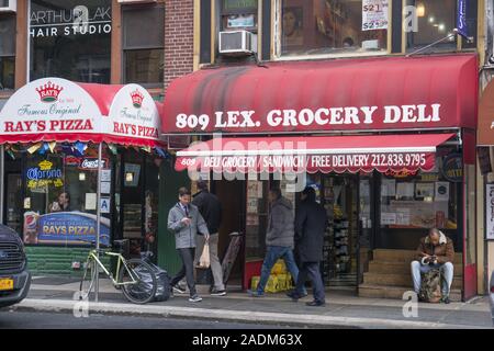 Stores and shops along Lexington Avenue on the East Side just north of midtown in the Lenox Hill neighborhood of Manhattan, New York City. Stock Photo