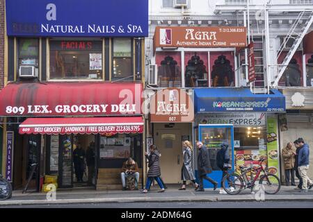 Stores and shops along Lexington Avenue on the East Side just north of midtown in the Lenox Hill neighborhood of Manhattan, New York City. Stock Photo
