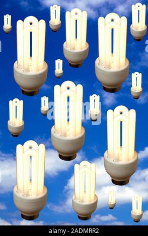 Energy saving light bulbs in the sky, composite image. Stock Photo