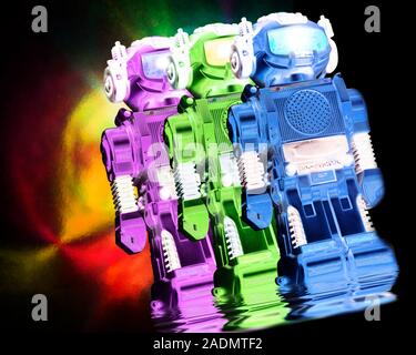 Toy robots. Computer artwork of three humanoid toy robots. Several brands of robotic toys have been developed since the late 1990s. Stock Photo
