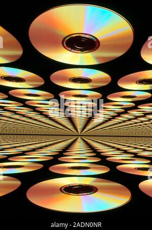 CD-ROM compact discs. Computer artwork of multiple CD-ROM discs used for data storage, depicted in three dimensional perspective. CD-ROM (Compact Disc Stock Photo