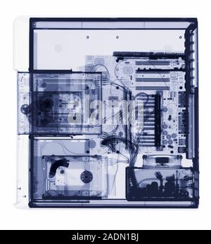 Desktop computer. X-ray of a desktop computer from above. The computer's hard drive (permanent storage, lower left), CD-ROM drive (compact disc - read Stock Photo