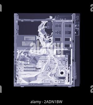Computer. Simulated X-ray of a vertical processing unit of a computer. The front of the unit (right) contains removable disc drives for data storage. Stock Photo