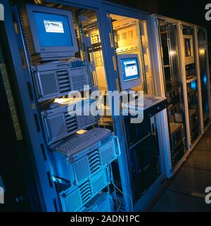 Computer server room in a university. A server is a computer that provides a service to other computers connected to it through a network. Servers mig Stock Photo