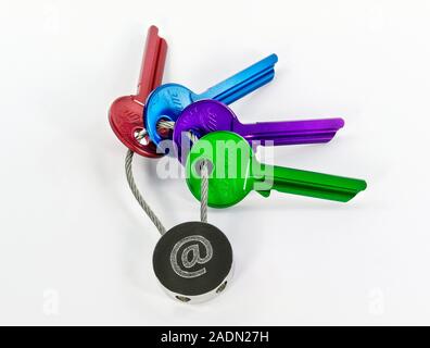 Internet security. Conceptual computer artwork of keys on a keychain with an @ symbol on it. This could represent internet security, or access to the Stock Photo