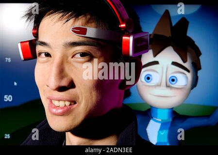 MindSet brainwave-reading headset. Person wearing a Mindset brain-computer interface (BCI) headset developed by Neurosky Inc., San Jose, USA. The head Stock Photo