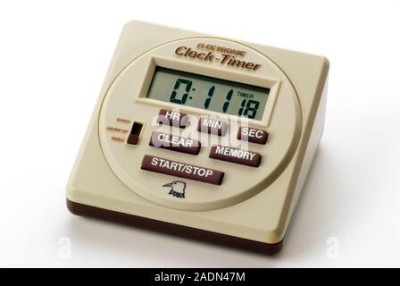 Digital timer and clock. This timer has an LCD (liquid crystal display) screen showing that there are 11 minutes and 18 seconds remaining. Timers like Stock Photo