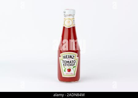 A bottle of Heinz Tomato Ketchup shot on a white background. Stock Photo