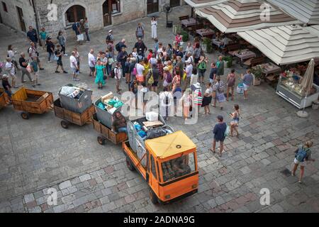 Montenegro, Sep 22, 2019: A large group of tourists at the Saint Tryphon Plaza in Kotor Old Town Stock Photo