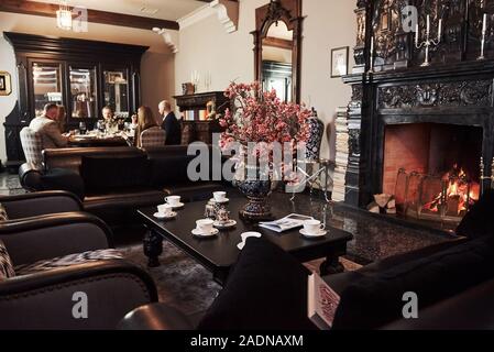 Ordinary day for these people. Family friends having nice time in beautiful luxury modern restaurant Stock Photo