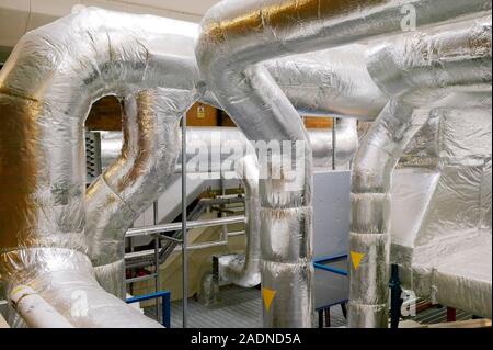 Clean room ventilation apparatus. Ventilation pipes being used to maintain and circulate clean air in a clean room facility. Clean room facilities are Stock Photo