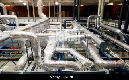 Clean room ventilation apparatus. Ventilation pipes being used to maintain and circulate clean air in a clean room facility. Clean room facilities are Stock Photo