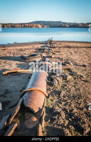 Pollution of the environment by waste from pipes or drainage. The concept of nature pollution sewerage. Discharge of toxic or contaminated water into Stock Photo