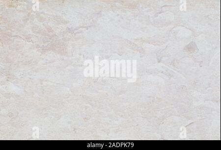 Close-up of a pale stone wall or slab. High resolution abstract full frame textured background. Stock Photo