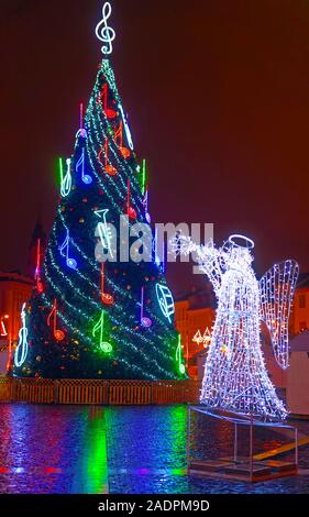 Christmas Mood on a snowless Town Hall Square reflex Stock Photo