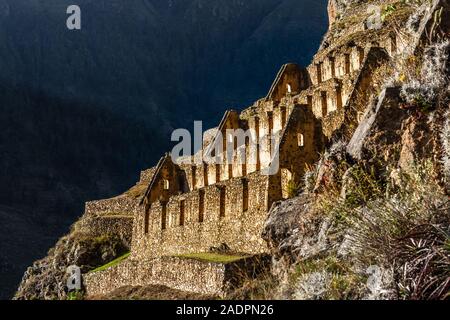 Pinkuylluna, ruins of ancient Inca storehouses located on mountains, Sacred Valley, Ollantaytambo, Peru Stock Photo