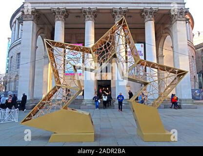 Golden star,Christmas decorations,outside Manchester Central Library,St Peter's Square, Manchester M2 5PD Stock Photo