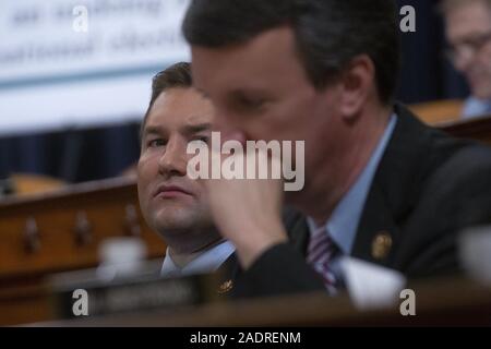 Washington, District of Columbia, USA. 4th Dec, 2019. United States Representative Guy Reschenthaler (Republican of Pennsylvania) listens during the United States House Committee on the Judiciary hearing with constitutional law experts Noah Feldman, of Harvard University, Pamela Karlan, of Stanford University, Michael Gerhardt, of the University of North Carolina, and Jonathan Turley of The George Washington University Law School on Capitol Hill in Washington, DC, U.S. on Wednesday, December 4, 2019. Credit: Stefani Reynolds/CNP/ZUMA Wire/Alamy Live News Stock Photo