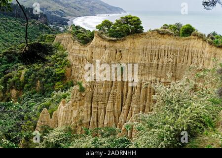 The Cathedrals or cathedral cliffs, badlands erosion, from the roadside, Gore Bay, Cheviot, south island, New Zealand. Stock Photo