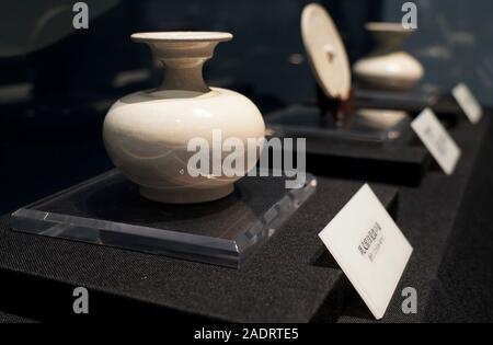 Xi'an, China's Shaanxi Province. 4th Dec, 2019. White porcelain wares of Tang Dynasty (618-907) are displayed at an exhibition in a museum in Xi'an, capital of northwest China's Shaanxi Province, Dec. 4, 2019. Credit: Liu Xiao/Xinhua/Alamy Live News Stock Photo