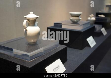 Xi'an, China's Shaanxi Province. 4th Dec, 2019. White porcelain wares of Tang Dynasty (618-907) are displayed at an exhibition in a museum in Xi'an, capital of northwest China's Shaanxi Province, Dec. 4, 2019. Credit: Liu Xiao/Xinhua/Alamy Live News Stock Photo