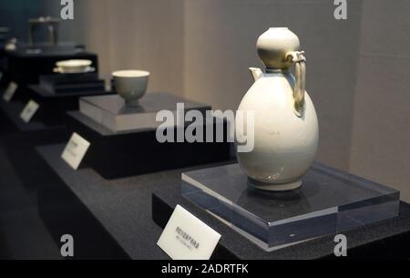 Xi'an, China's Shaanxi Province. 4th Dec, 2019. White porcelain wares of Tang Dynasty (618-907) are displayed at an exhibition in a museum in Xi'an, capital of northwest China's Shaanxi Province, Dec. 4, 2019. Credit: Liu Xiao/Xinhua/Alamy Live News Stock Photo