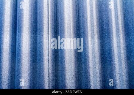 Silver Light Blue Corrugated Lead, Metal Abstract Patterns Background Reykjavik Iceland.  Most houses in Iceland are made from corrugated lead metal b Stock Photo