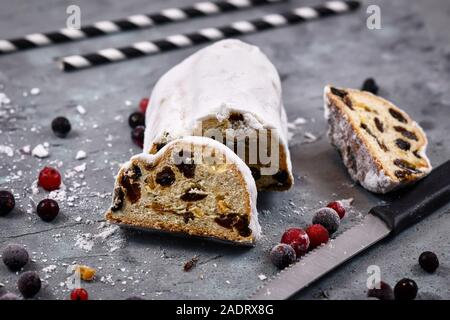 Slice of traditional German christmas season sweet food called 'Stollen ...