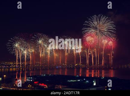 Fireworks on Qatar National day in Doha. Stock Photo