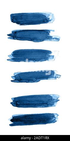 Classic blue color of year 2020 Close up of Blue strokes of watercolor paint of different sizes on a white isolated background. Stock Photo