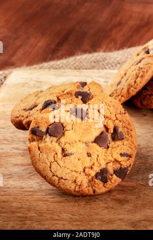 Chocolate chip cookie, gluten-free, a closeup on a dark rustic background with copy space Stock Photo