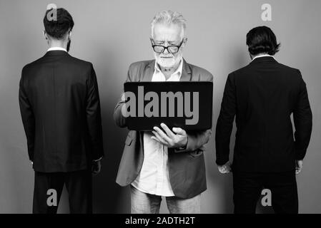 Portrait of multi ethnic bearded businessmen together Stock Photo