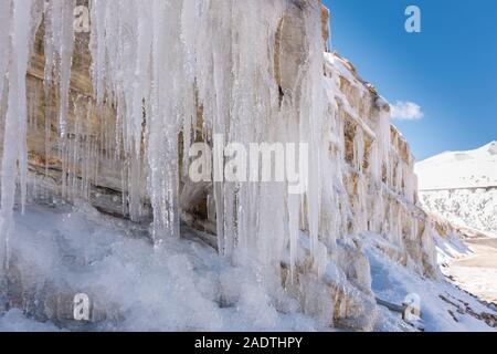 Icicles on a mountain side Stock Photo