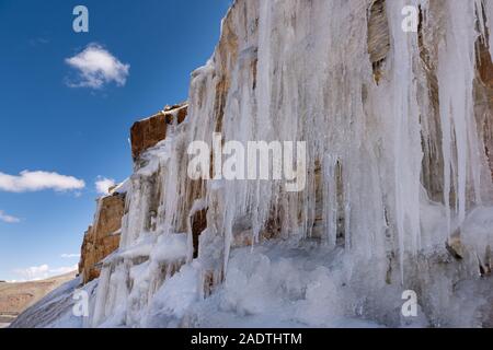 Icicles on a mountain side Stock Photo